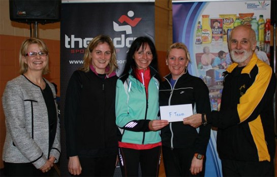 Vanessa Clarke, General Manager of Pepsico Carrigaline and Pat Twomey, Chairman of Eagle AC presenting the prize for the winning womens team to Bandon AC