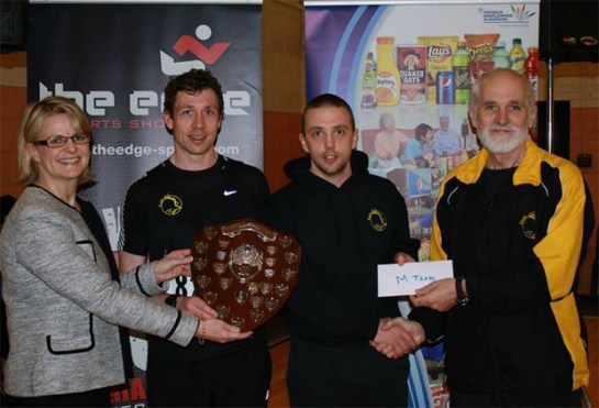 Vanessa Clarke, General Manager of Pepsico Carrigaline and Pat Twomey, Chairman of Eagle AC presenting the prize for the winning mens team to Eagle AC